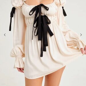 Rumored Cream Macbeth dress